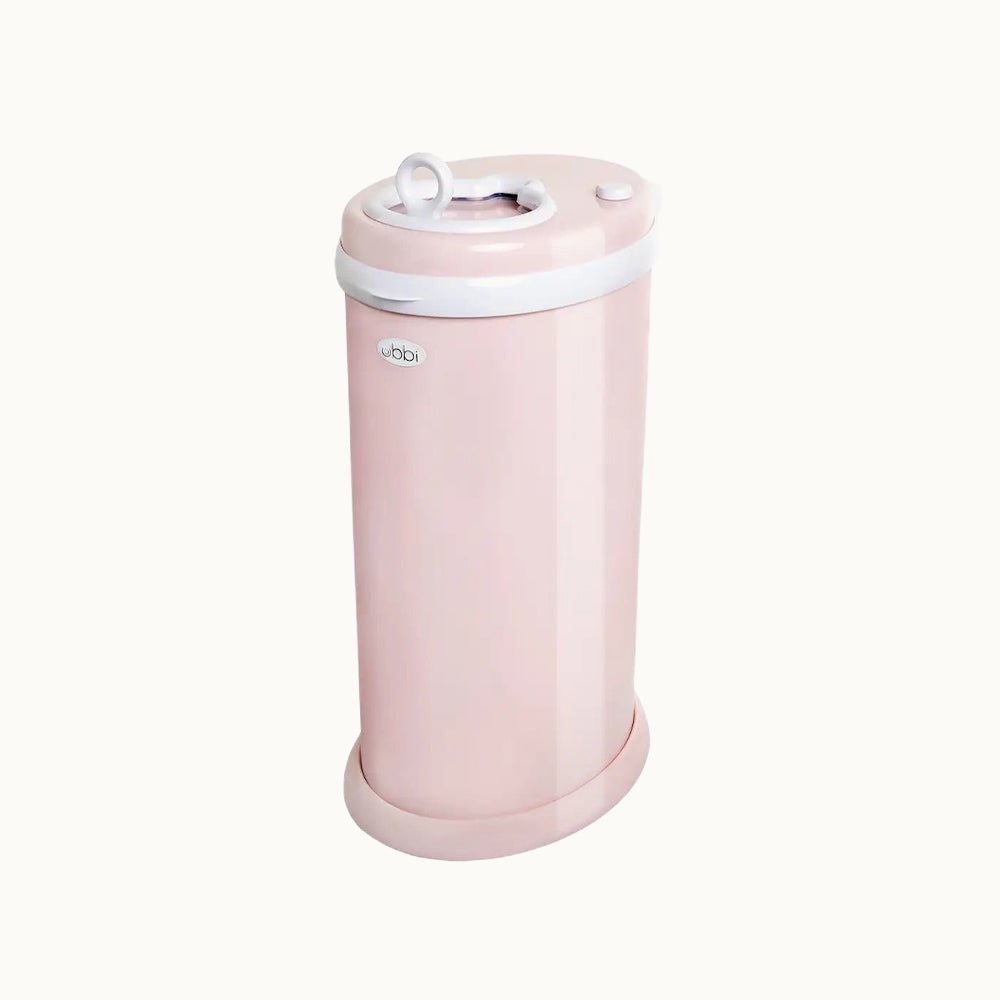 Ubbi Steel Diaper Pail in soft pink with closed lid