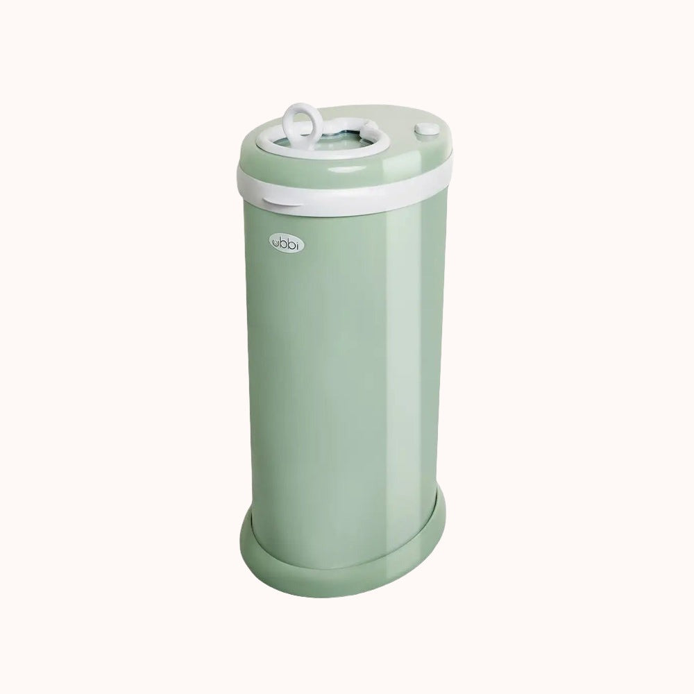 Ubbi Steel Diaper Pail in green with closed lid