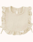 Close-up of Ali + Oli Muslin Cotton Ruffle Baby Bib in Ivory color