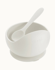 White silicone suction bowl with a spoon designed for easy feeding