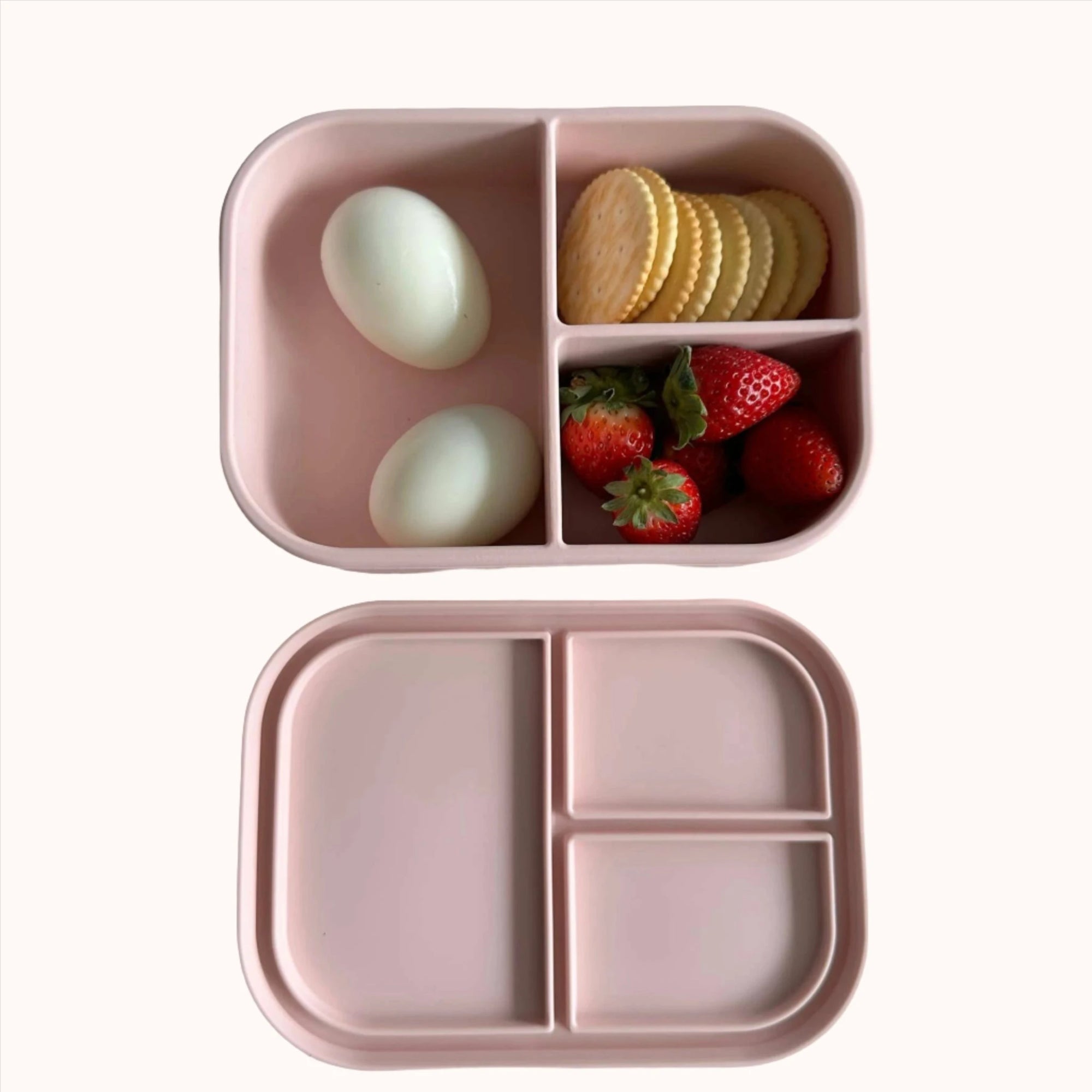 Nutritious meal presentation in Ali+Oli blush bento box with fruit and protein compartments