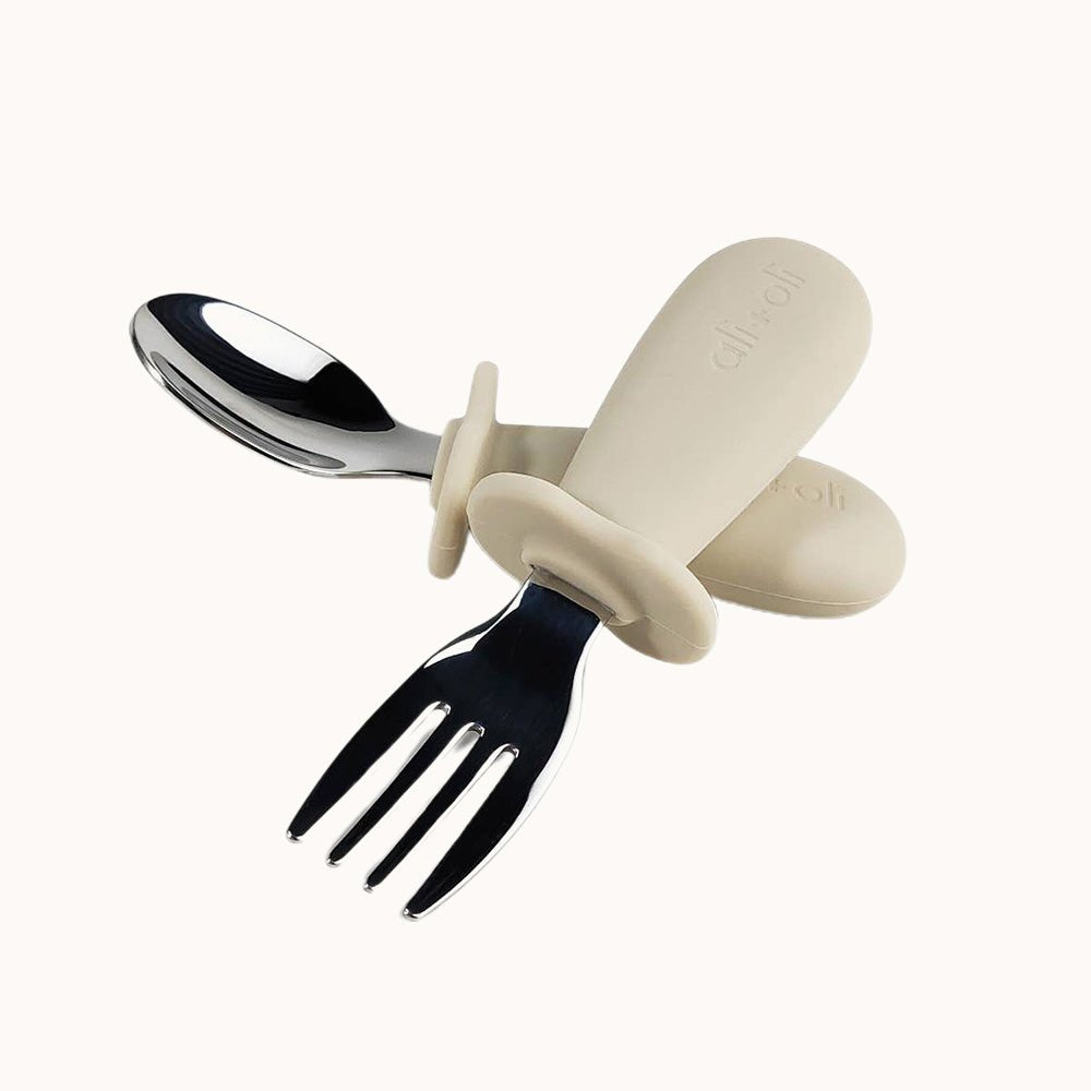 Ali+Oli learning utensils for toddlers featuring khaki handles