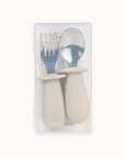 Ali+Oli khaki spoon and fork set for toddlers packaged in a transparent case