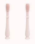 Pair of infant finger toothbrushes with soft pink handles