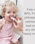 Child chewing on a BPA and phthalate-free baby finger toothbrush with safety text displayed