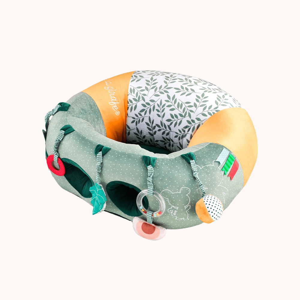 Detail of the Sophie La Girafe Baby Seat with playful green and orange elements