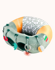 Detail of the Sophie La Girafe Baby Seat with playful green and orange elements