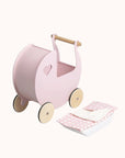 Pink bedding set for doll's pram with heart shaped design