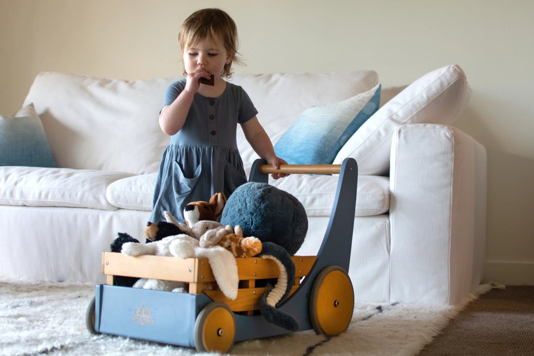 Child with a Kinderfeets Cargo Walker in Slate Blue