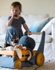 Child with a Kinderfeets Cargo Walker in Slate Blue