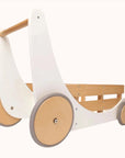 Side view of the white Kinderfeets Cargo Walker with wooden wheels