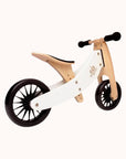 White-seated Kinderfeets Tiny Tot Plus wooden bike with black wheels