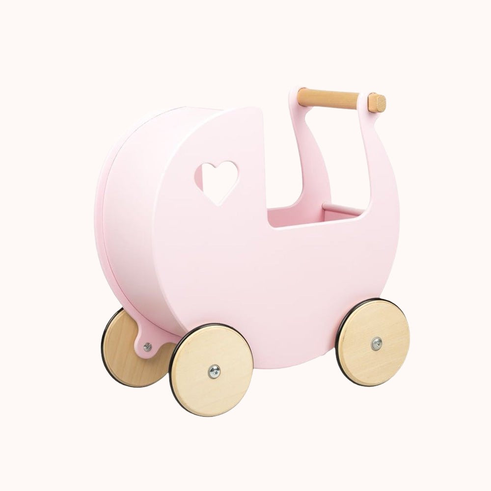 Close-up of the light pink Moover doll pram featuring a heart-shaped wooden handle