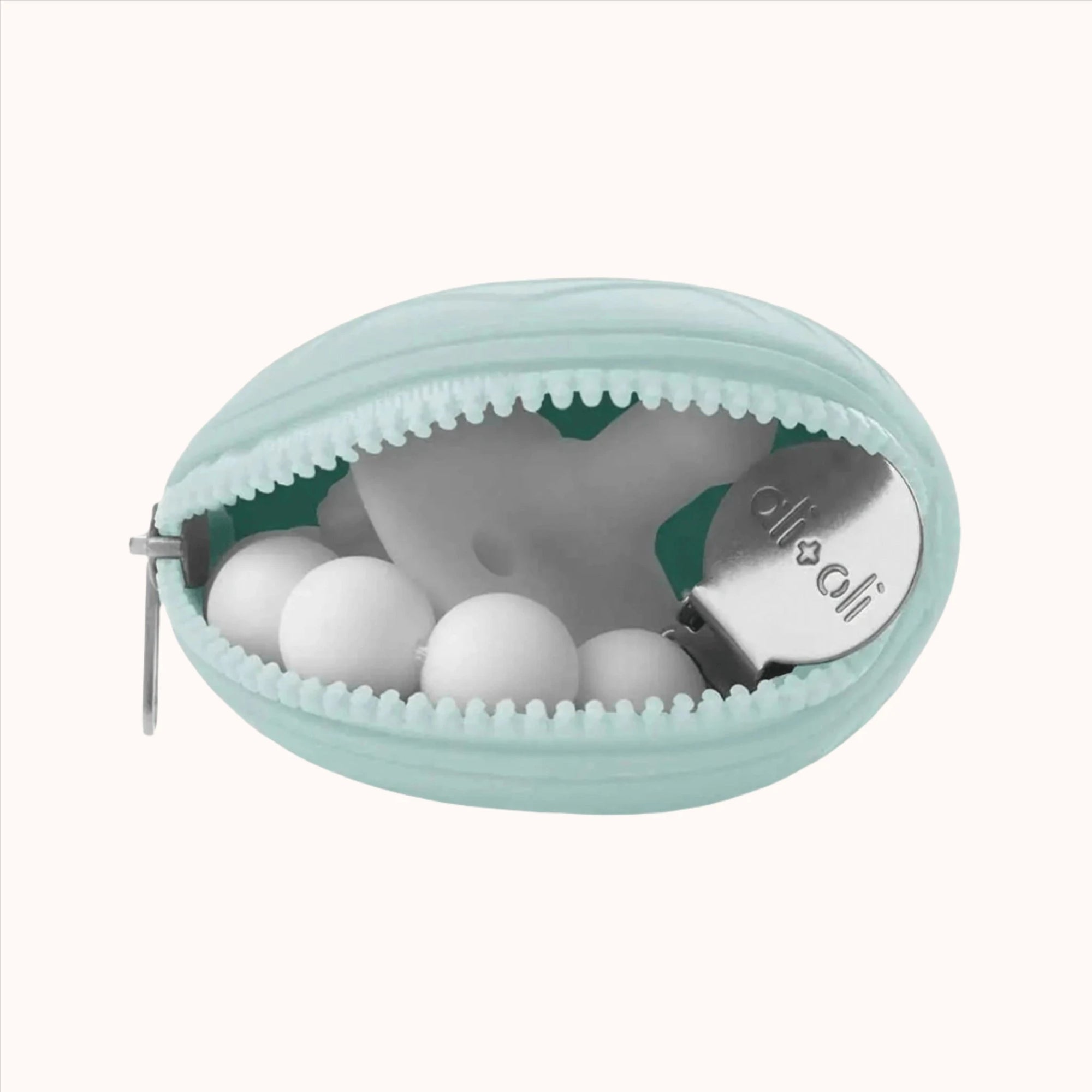 Portable mint green pacifier holder with space showing pacifier inside