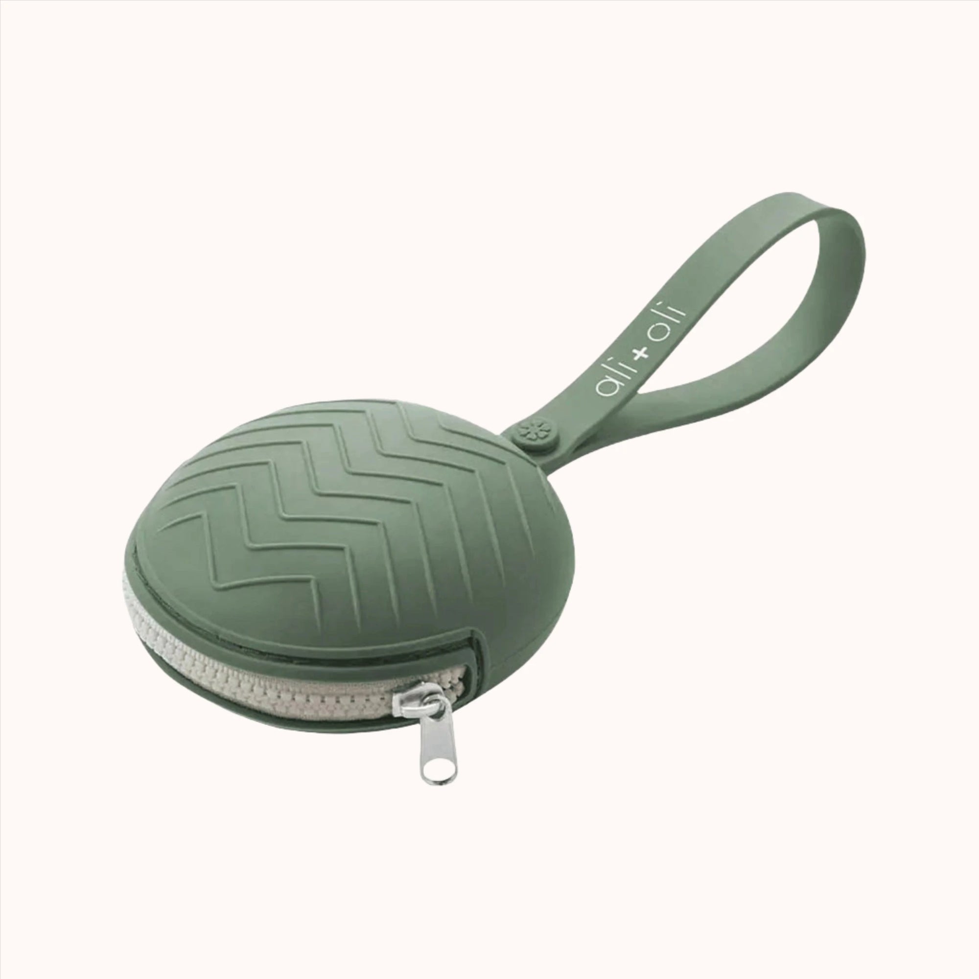 Durable green plastic pacifier case featuring a secure zipper closure