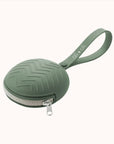 Durable green plastic pacifier case featuring a secure zipper closure