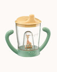 Non-slip cup for babies featuring Sophie la Girafe mascot on the lid