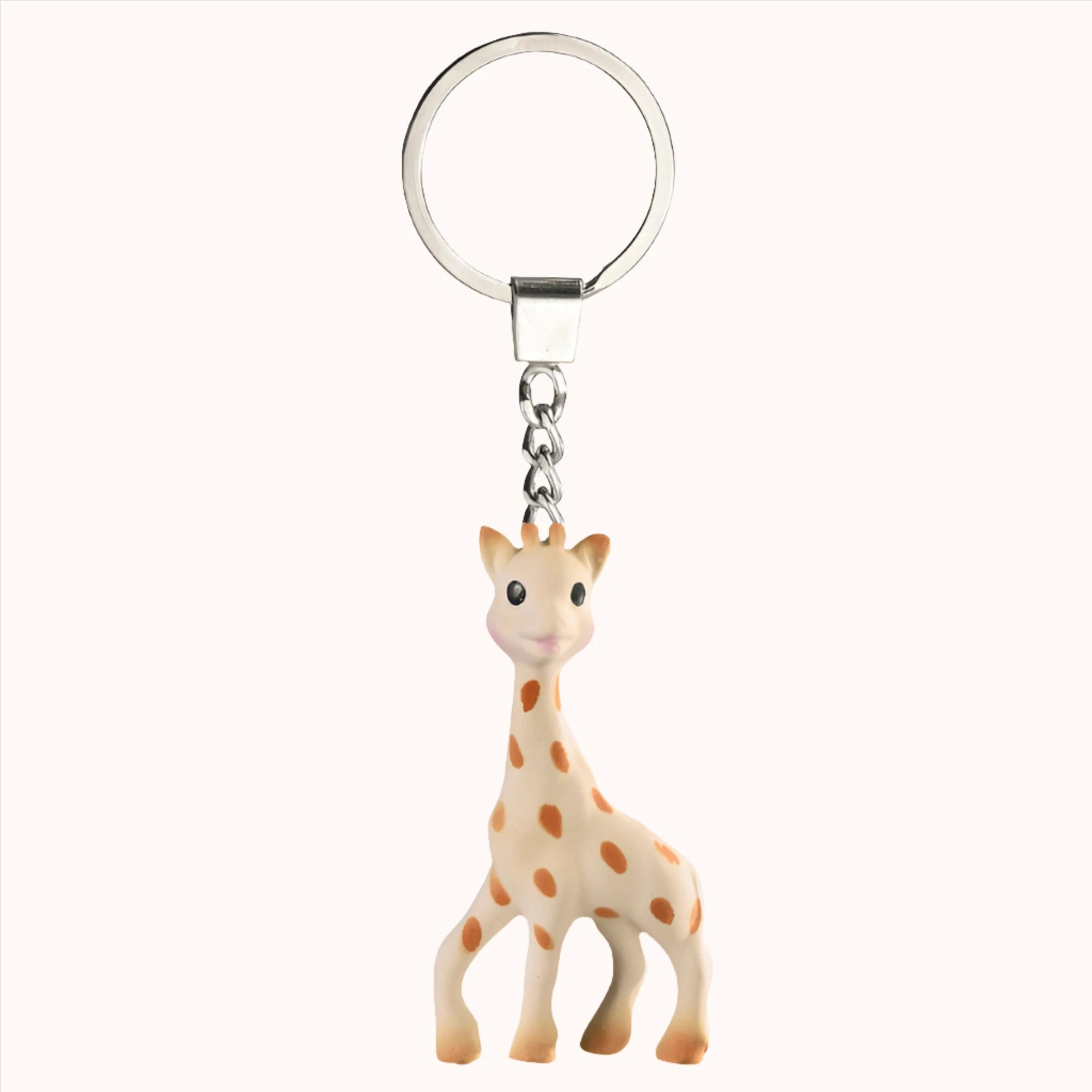 Giraffe-themed keychain included in the Sophie Save the Giraffes gift set