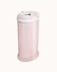 Ubbi Steel Diaper Pail in pink with closed lid