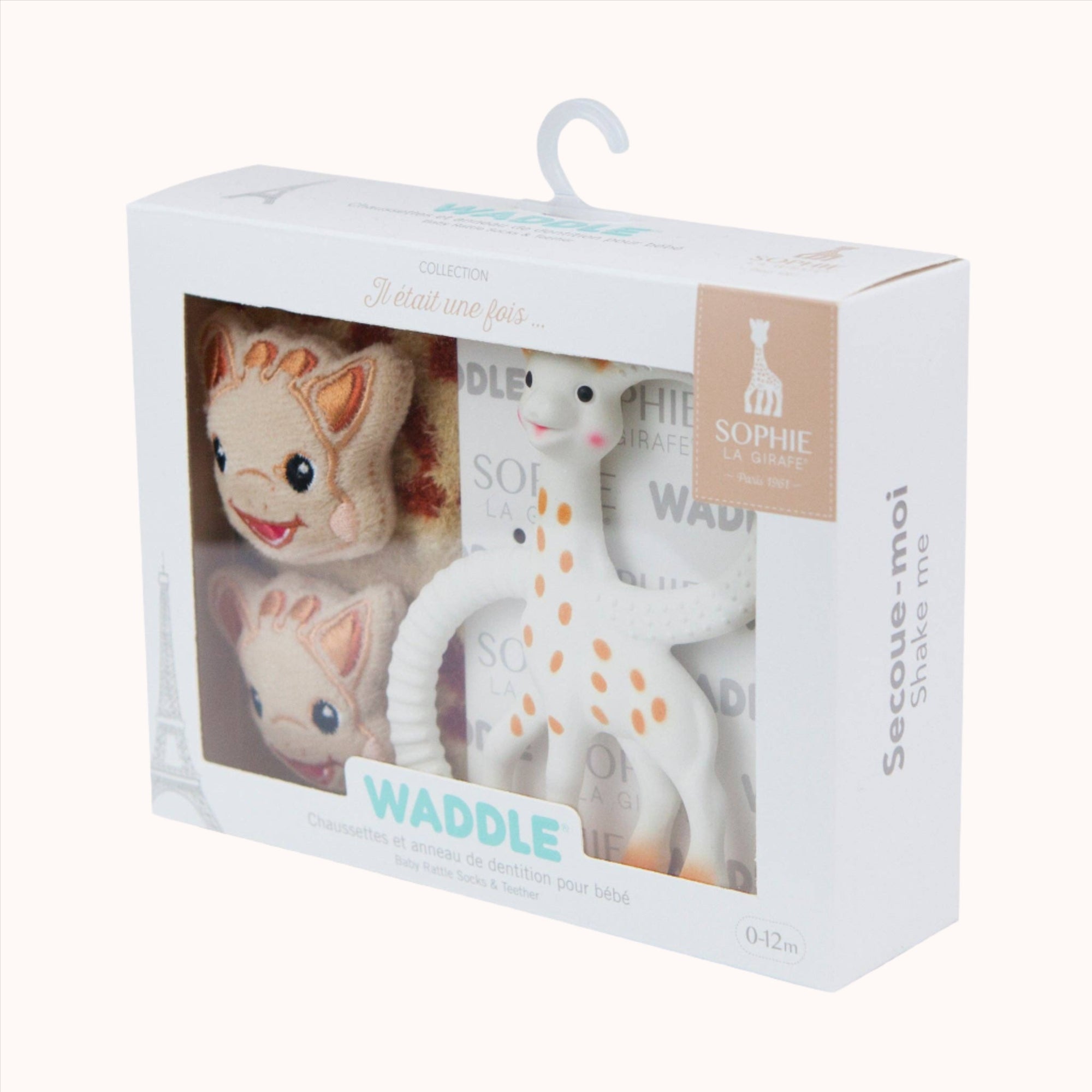 A set of Waddle Rattle Socks with giraffe and bear designs in packaging