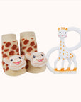 Waddle Rattle Socks designed to look like baby shoes with a giraffe toy